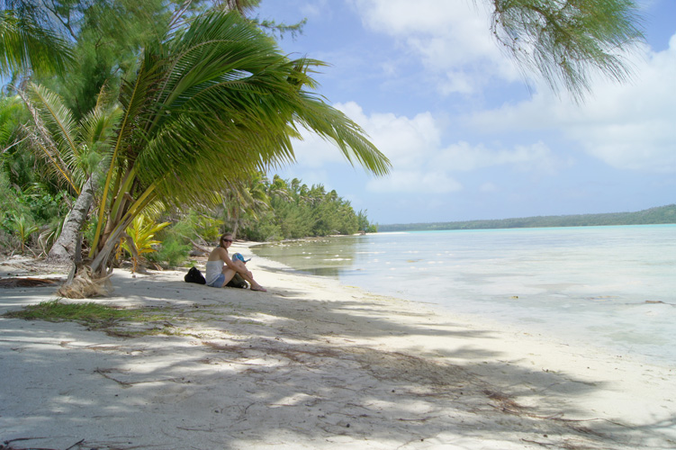 Holly enjoying lunch on a secluded beach we found in Aitutaki.