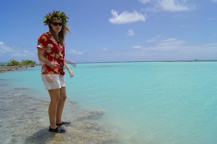 Holly wearing a flower 'hei' we bought from a woman making them near the dock in Raiatea.